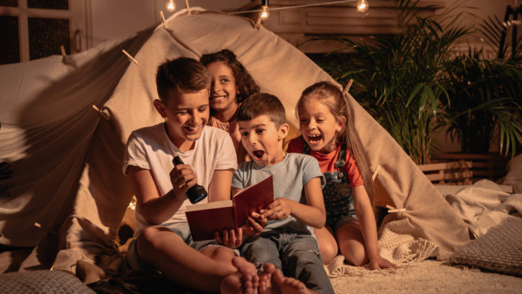 kids reading a story together.